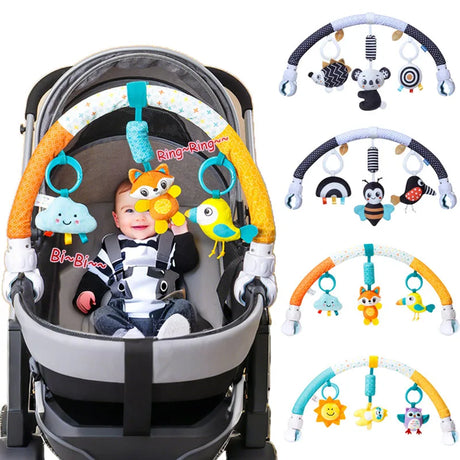 Baby in stroller with colorful carabiner toy attached, featuring various animal designs.
