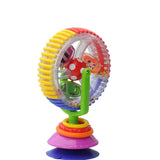 Colorful toy ferris wheel with cartoon characters.