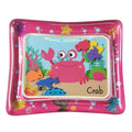 Inflatable children's play mat with a cartoon crab design on a pink border.