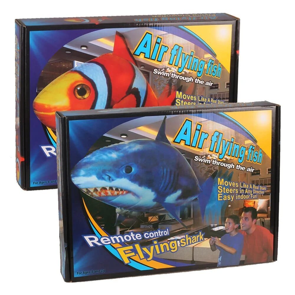 Two boxes of remote control air flying fish toys with shark design.