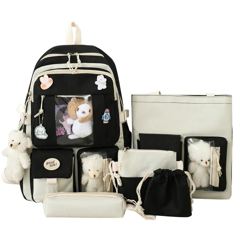 Backpack set with various pouches and a teddy bear.