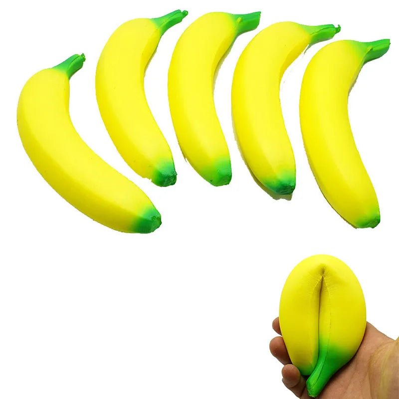 Set of yellow banana-shaped stress relievers with green tips.