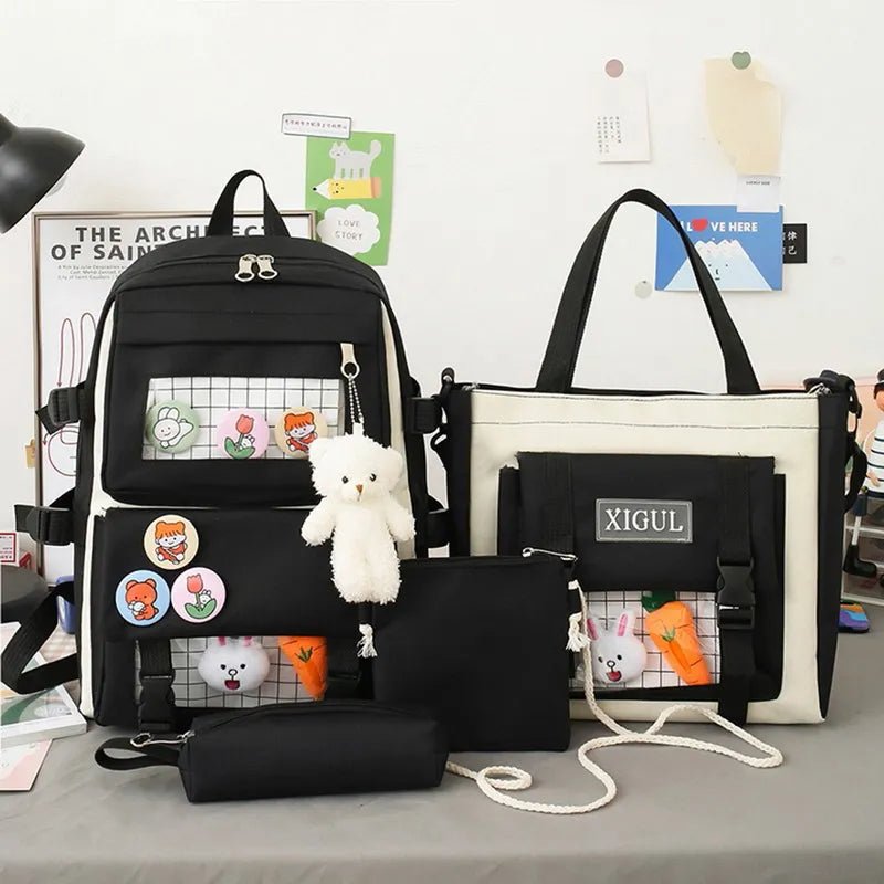 Black and white bags with cartoon designs on a desk