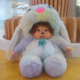 A stuffed toy rabbit with a small doll 