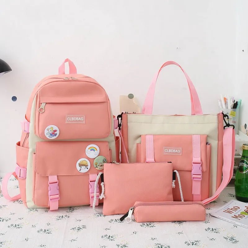 Set of pink bags including a backpack, tote bag, and pouch.