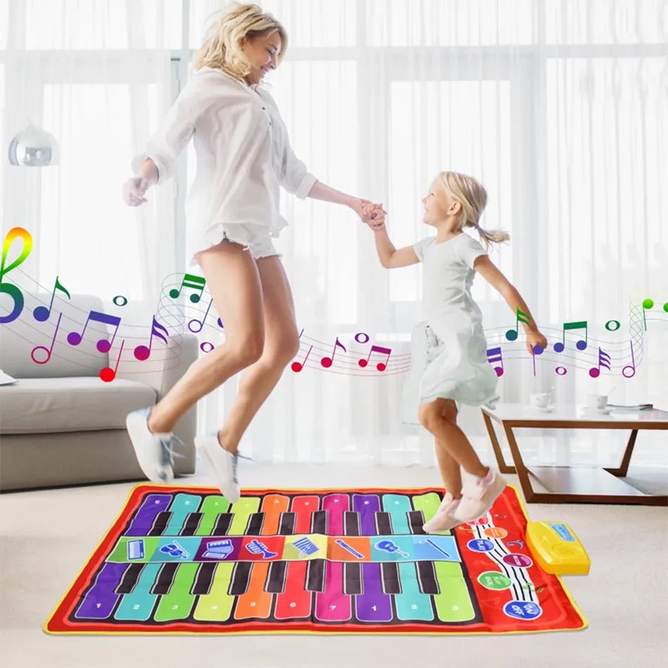 Woman and child playing on a colorful musical mat in a living room.