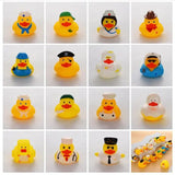 Set of yellow rubber duck toys dressed in various costumes.