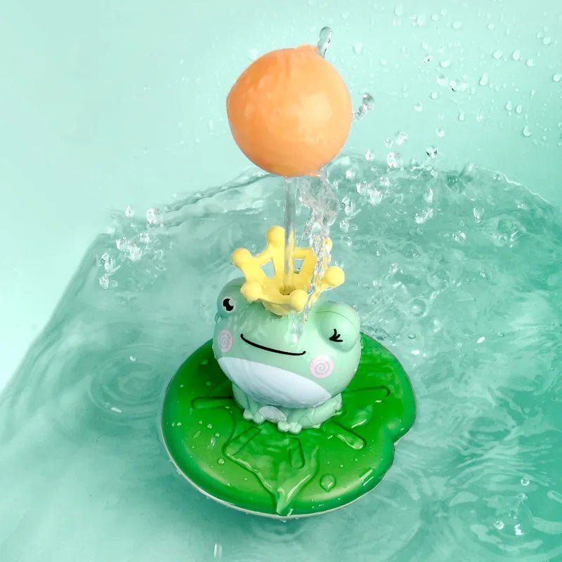 Toy frog with a ball on a leaf in water