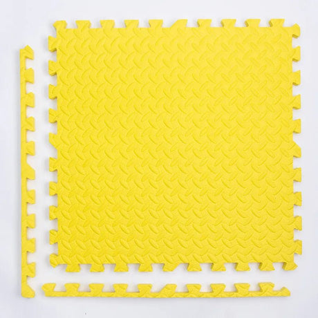 Yellow interlocking foam mat.