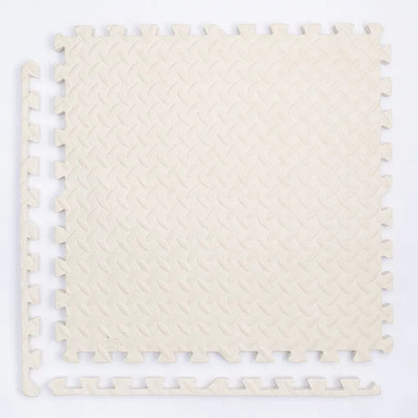 Beige interlocking foam mat.
