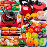 Colorful toy kitchen set with pots, pans, and food items 