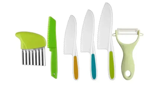 Set of kitchen knives and tools, including a peeler.