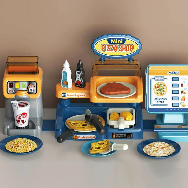 Toy mini pizza shop set with various items.