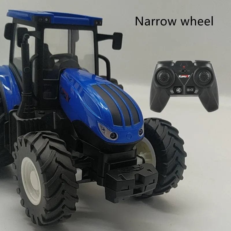 Blue toy tractor with large wheels and a remote control.