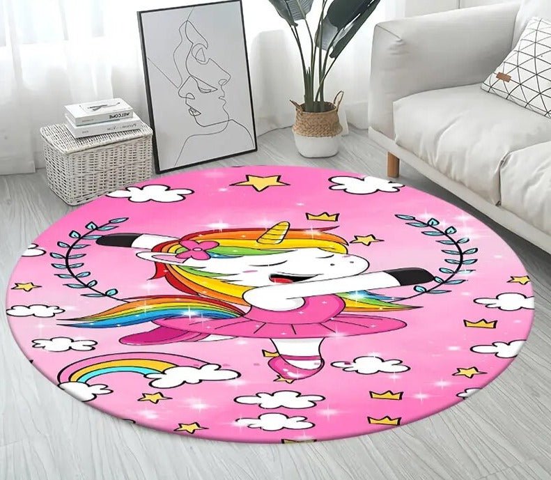Round pink rug with unicorn design in a living room setting