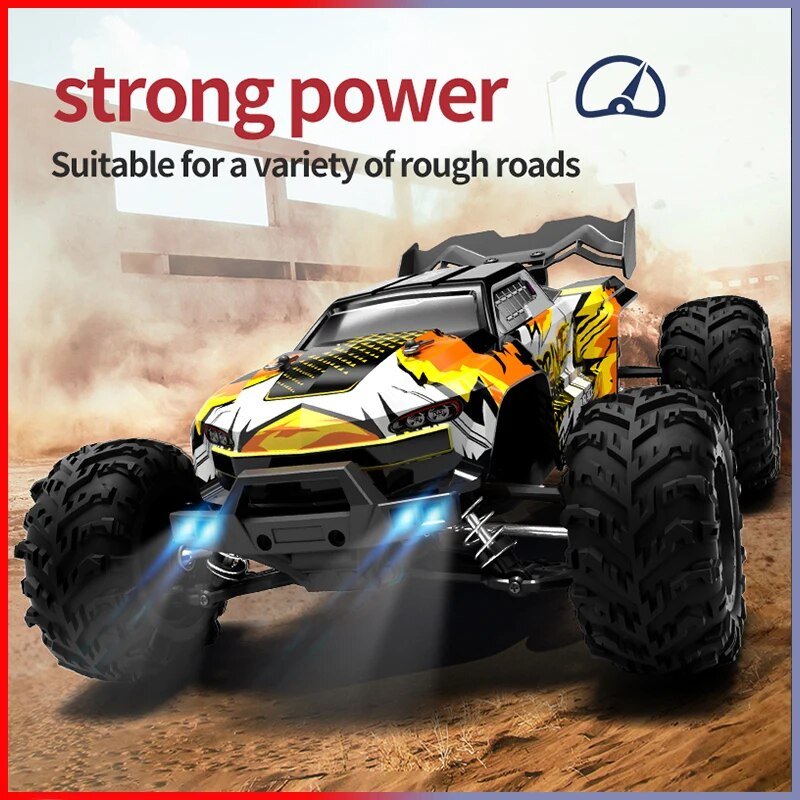 Toy monster truck with large wheels on a desert background, featuring the text 'strong power' and 'Suitable for a variety of rough roads'.