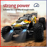 Toy monster truck with large wheels on a desert background, featuring the text 'strong power' and 'Suitable for a variety of rough roads'.