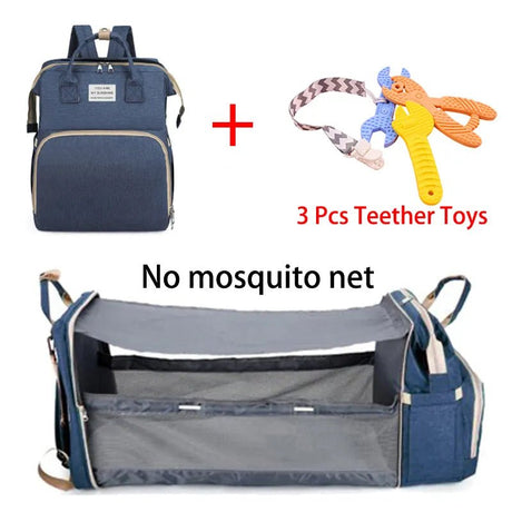 Blue baby bag with mosquito net, teether toys, and a backpack.