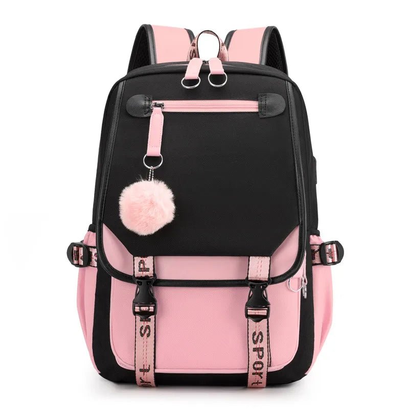 Pink and black backpack with a pom-pom.