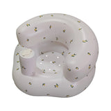 Inflatable baby seat with cup holder on a white background