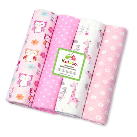 Four pink baby blankets with animal and floral patterns, featuring a Kolaco label.