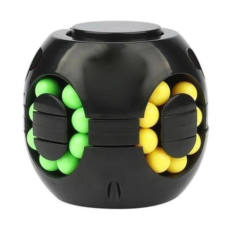 Black fidget cube with green and yellow balls.