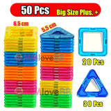 Colorful geometric shape building blocks with size indicators.