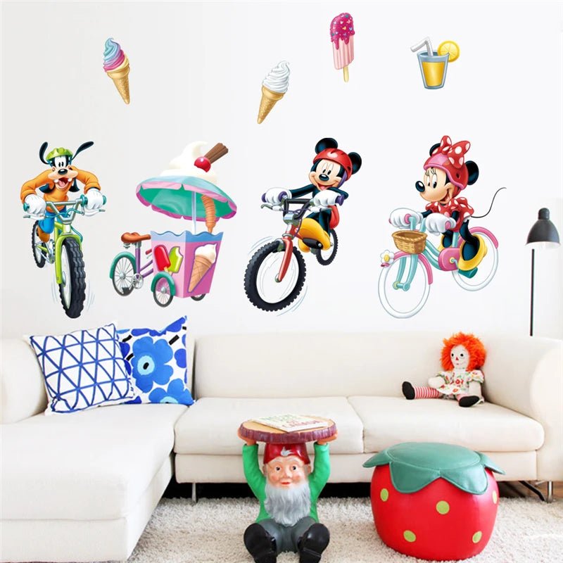 Colorful wall stickers of cartoon characters and ice cream cones on a white wall.