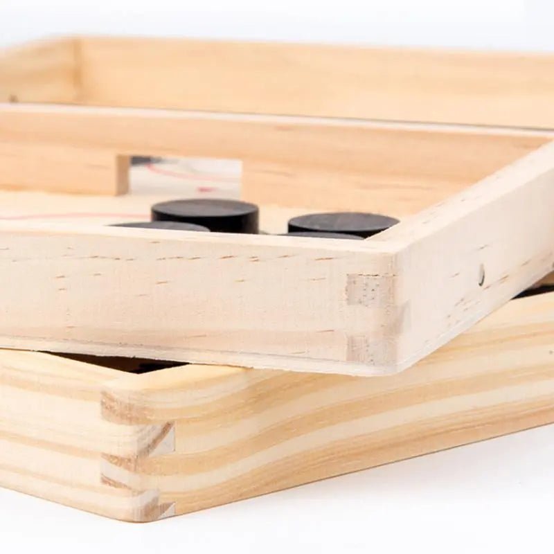 Close-up of a wooden pallet with metal brackets.