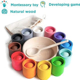 Colorful Montessori toy set with wooden bowl and spoon.