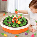 Child playing with a toy garden set 
