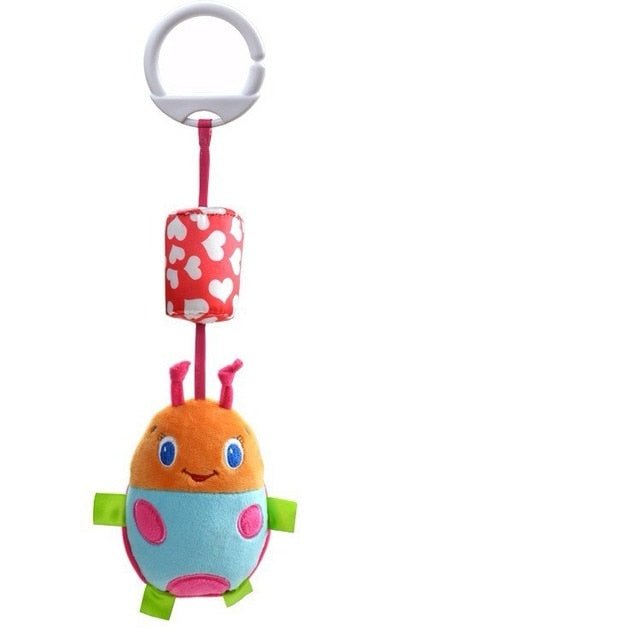 Colorful plush toy with a red heart-shaped object.