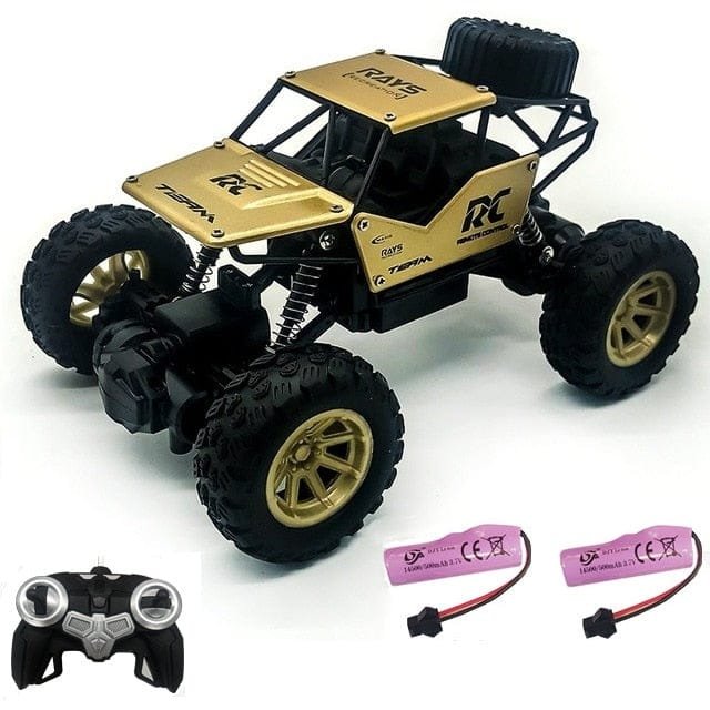 Gold and black RC car with remote control and batteries 