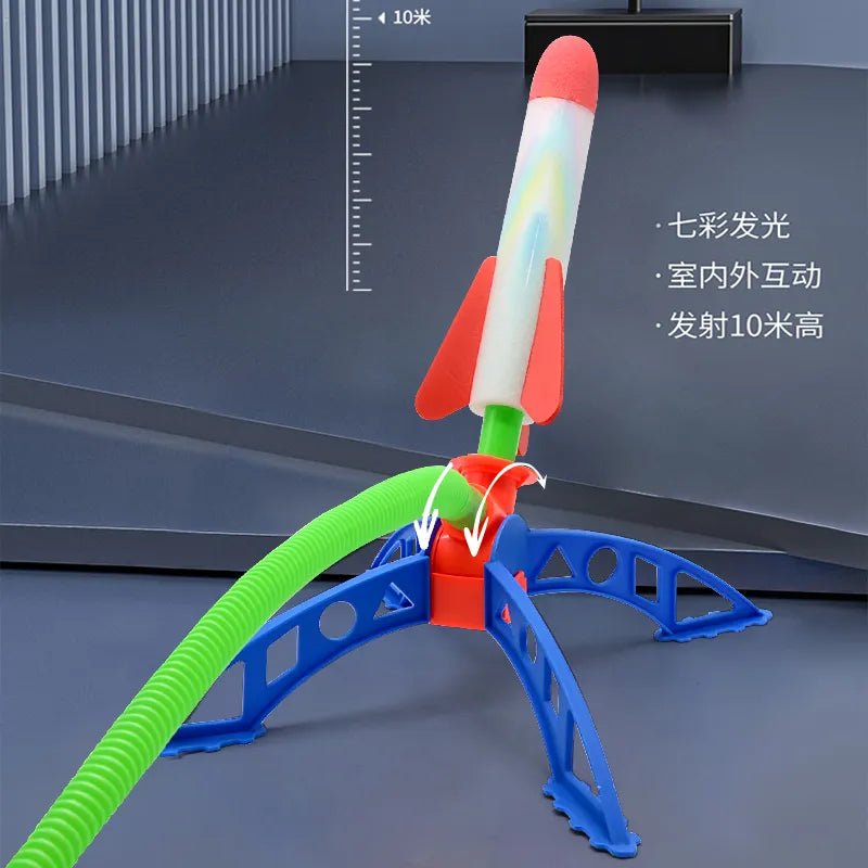 Toy rocket launch set with colorful design.
