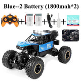 RC car with accessories, including remote control, batteries, and cable