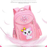 Pink backpack with a cat design