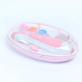 Pink and white container with colorful beads on a light purple background