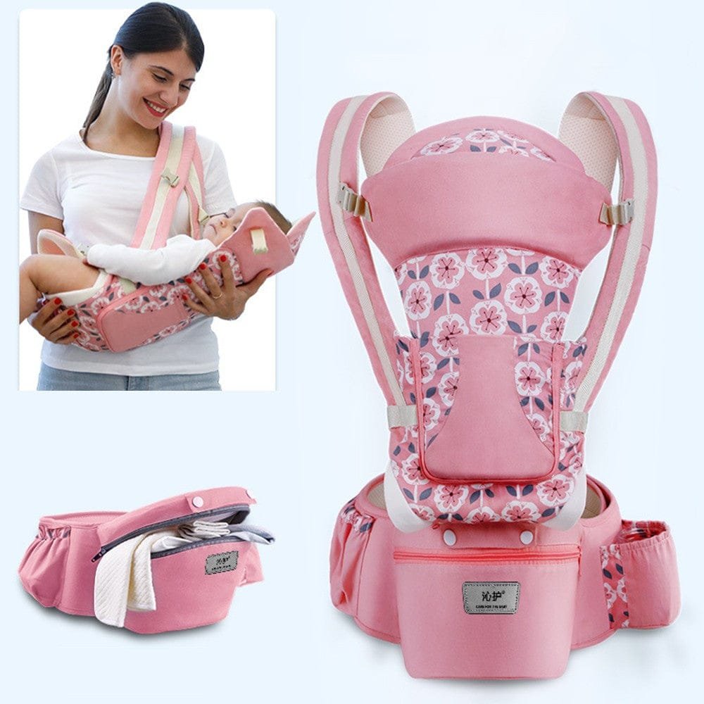 Pink baby carrier with floral design, shown with a woman holding a baby and the product on a white background.