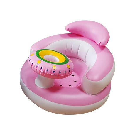 Pink inflatable baby seat with a toy on a white background