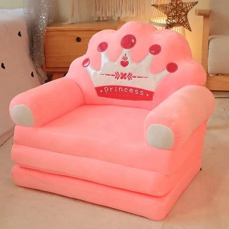 Pink inflatable chair with princess design on a light-colored floor.