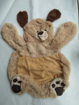 Plush toy shaped like a dog on a white background