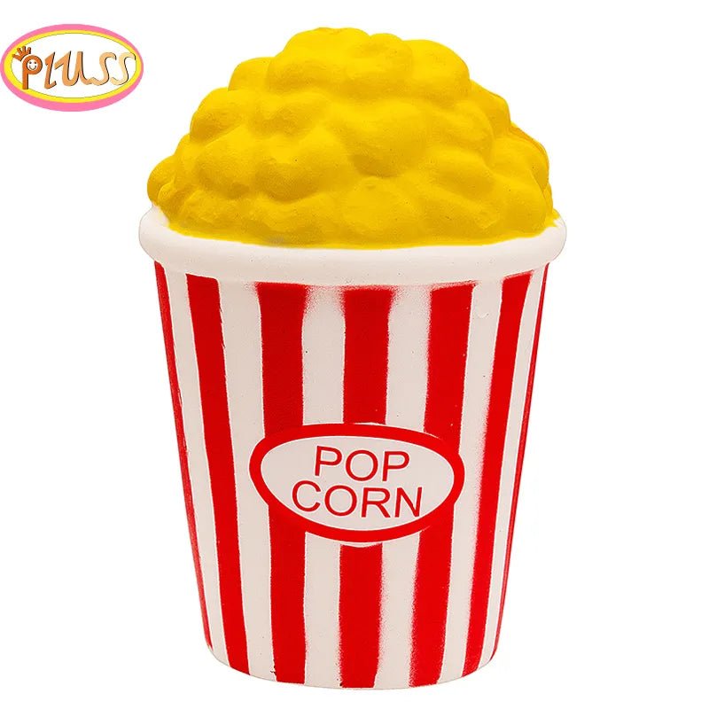 Popcorn container with yellow popcorn on a white background