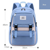 Blue backpack with dimensions and a visible brand label