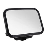 Car side mirror with a black frame 