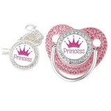 Pink 'Princess' pacifier with decorative elements on a white background