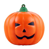 Pumpkin with a jack-o'-lantern face on a white background