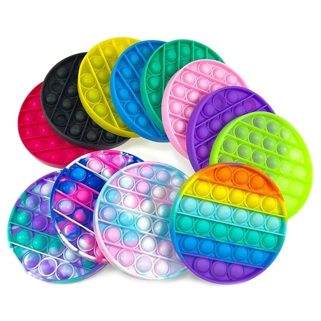Assorted colorful pop-it fidget toys.