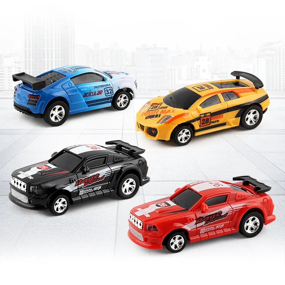 Four toy cars in blue, yellow, black, and red