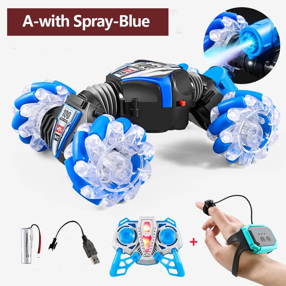 Toy robot with blue and clear wheels, remote control, and power adapter.