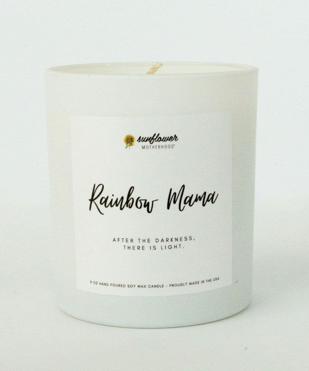 White candle with 'Rainbow Mama' text.